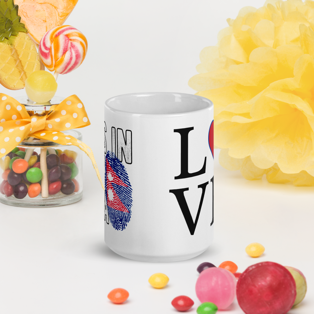 White I love Nepal coffee mug with fingerprint heart design surrounded by colorful candies