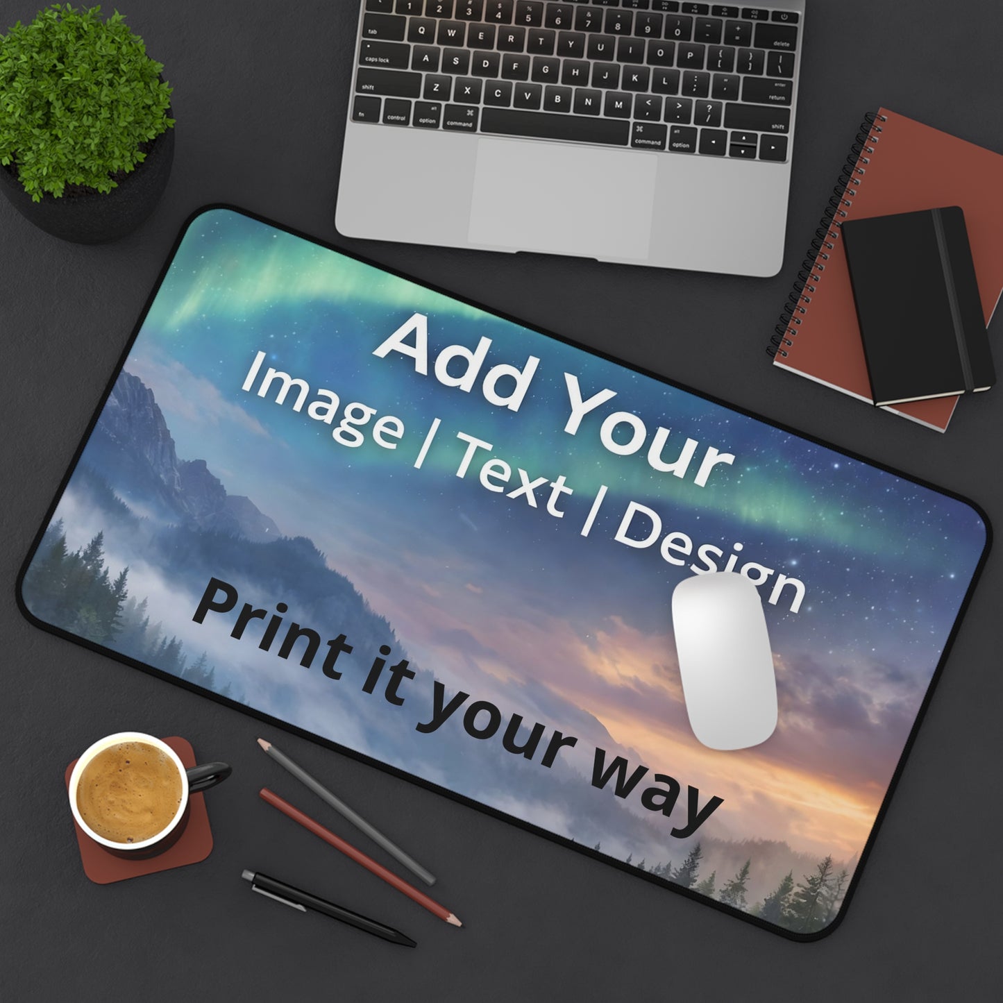 Desk pad 12x 22 Customizable mouse pad with scenic design on a desk with laptop, notebook, and coffee cup.