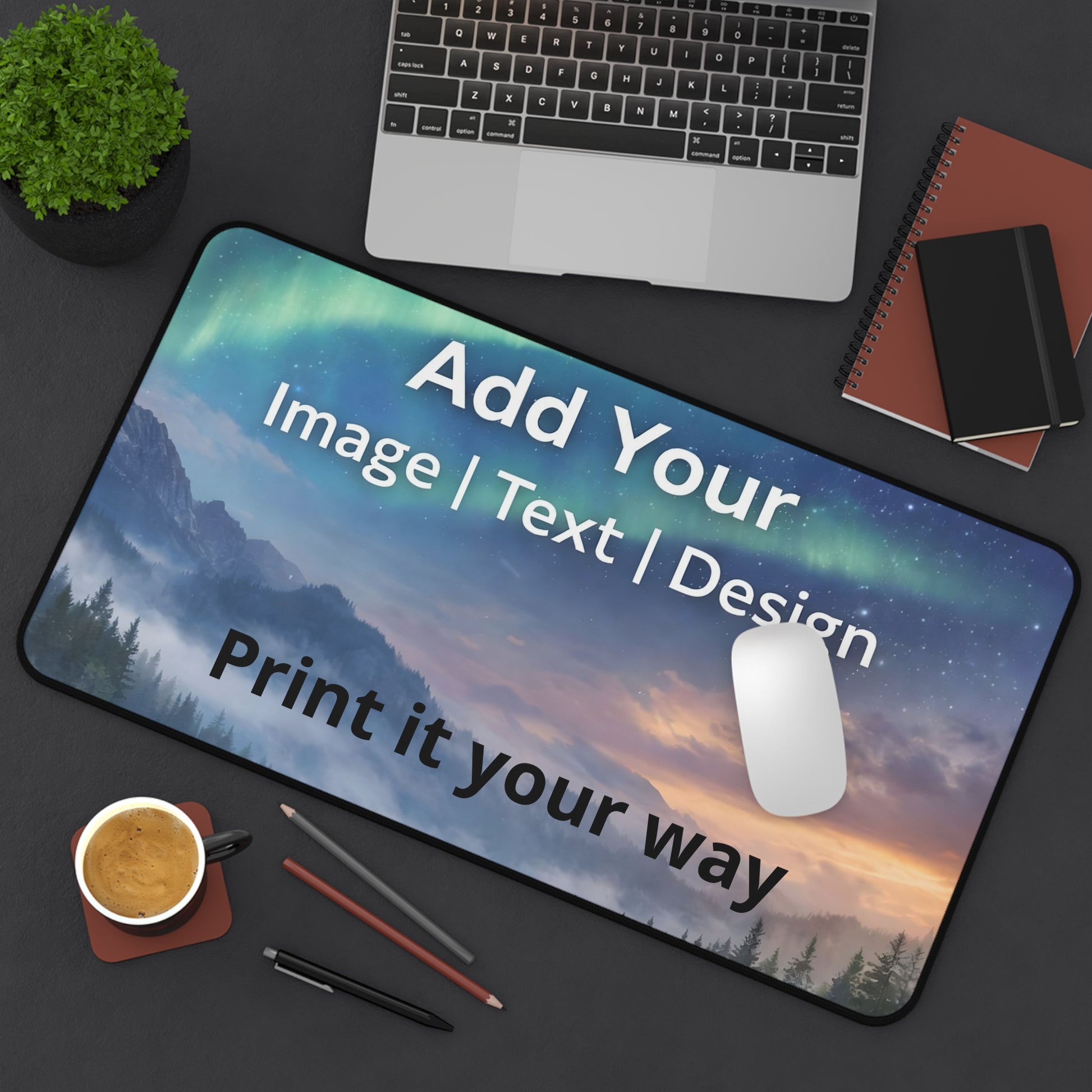 Desk pad 12x 22 Customizable mouse pad with scenic design on a desk with laptop, notebook, and coffee cup.