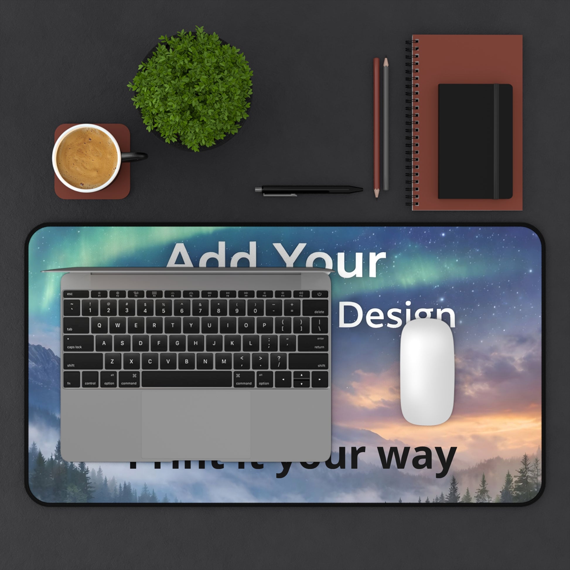 Desk pad 12x 22 Desk setup with laptop, mouse, and stationery on a dark surface