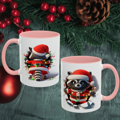 Holiday raccoon coffee cup with pink handle and interior featuring raccoon in Santa outfit with Christmas lights