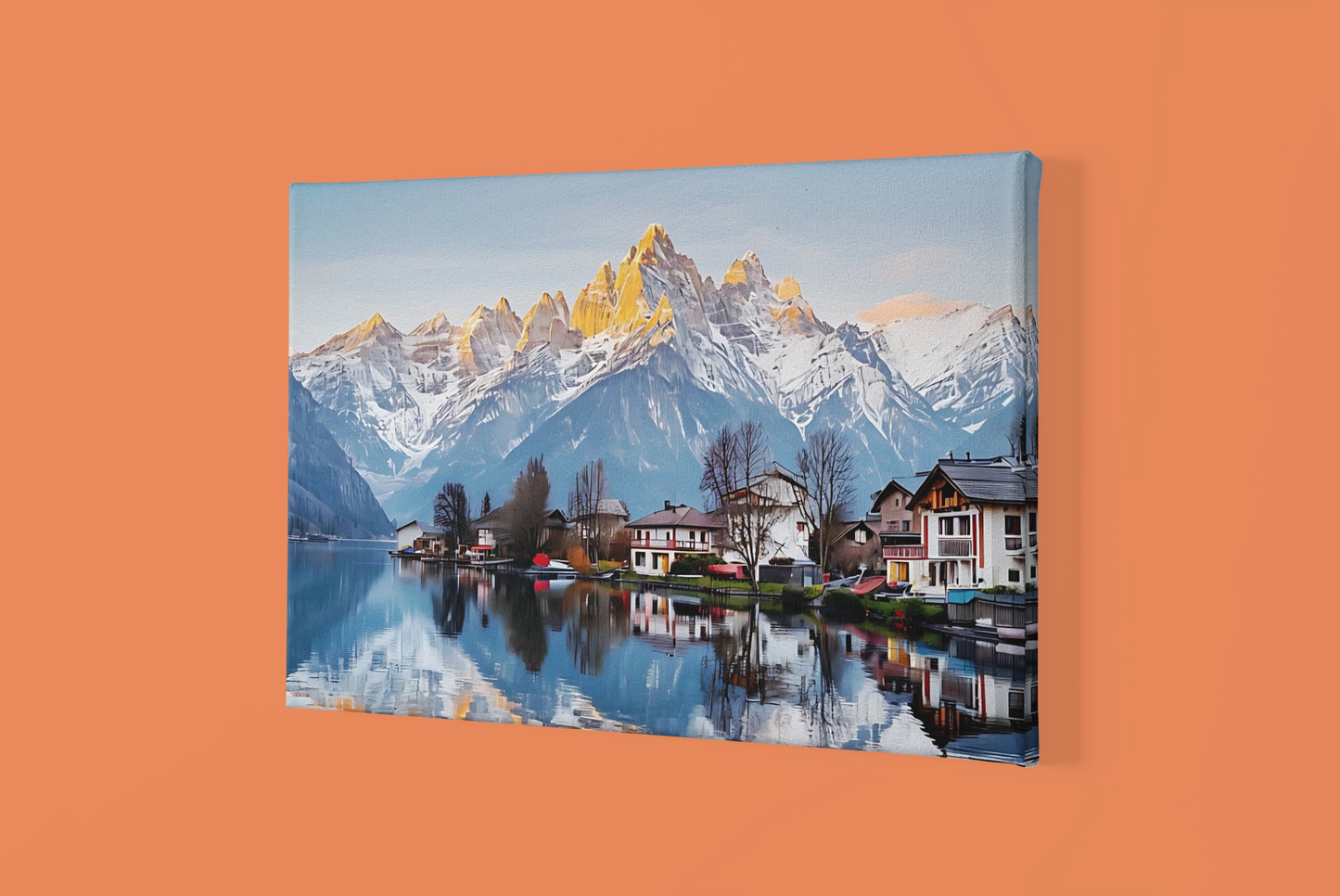 Mountain lake canvas wall art featuring snow-capped peaks and lakeside village reflection