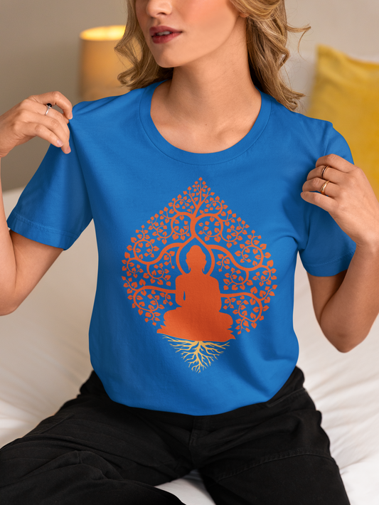 Blue spiritual yoga shirt cotton with orange Buddha and tree design worn by woman